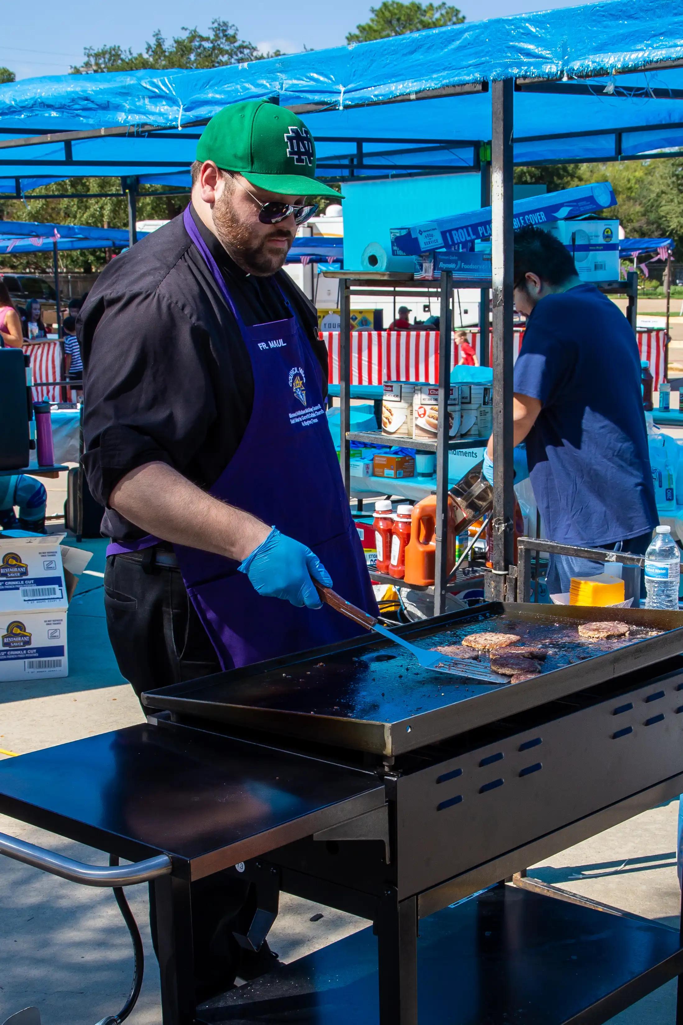 GorettiFest volunteer preparing food